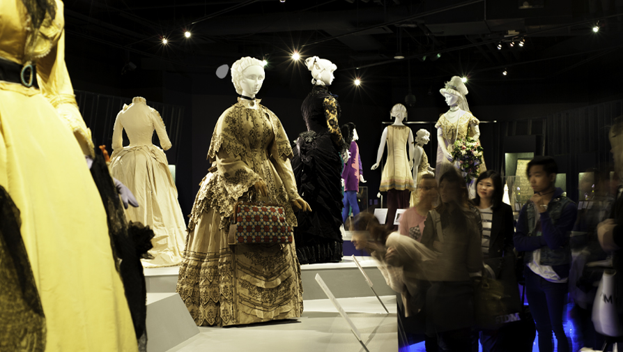 dresses on display in an exhibit